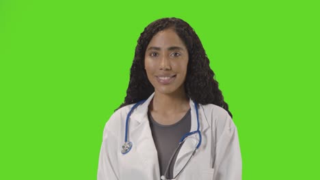 Portrait-Of-Female-Doctor-In-White-Lab-Coat-With-Stethoscope-Against-Green-Screen-3
