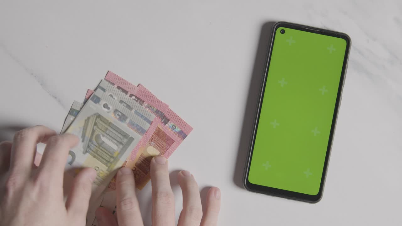 Free Stock Video Overhead Currency Shot Person Counting Euro Notes free-stock-video-overhead-currency-shot-person-counting-euro-notes