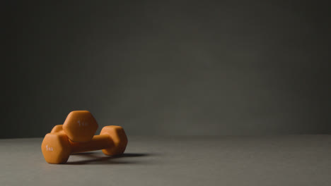 Fitness-Studio-Shot-Of-Exercise-Dumbbell-Weights-Against-Grey-Background-6