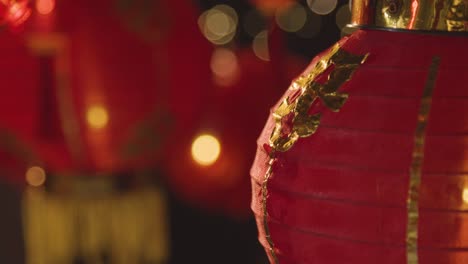Close-Up-Of-Colourful-Chinese-Lanterns-Celebrating-New-Year-Hung-Against-Black-Background-1