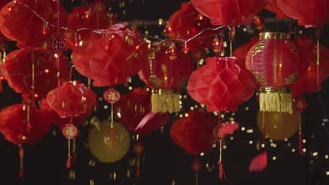 Studio-Shot-Of-Chinese-Lanterns-Celebrating-New-Year-With-Falling-Confetti-1