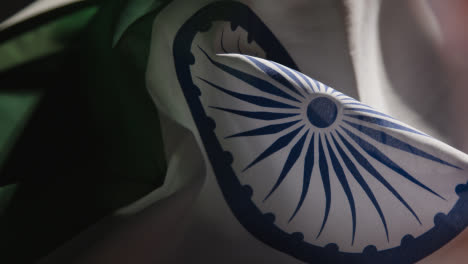 Handheld-Close-Up-Shot-of-Indian-Flag-Rotating