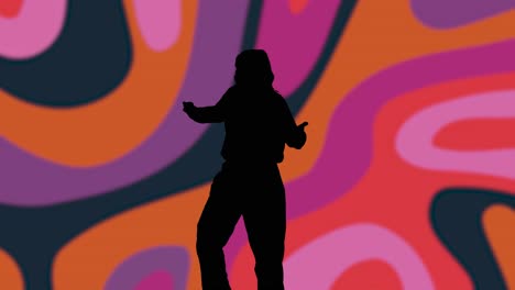 Studiosilhouette-Einer-Frau,-Die-Vor-Mehrfarbigem-Musterhintergrund-Tanzt-1