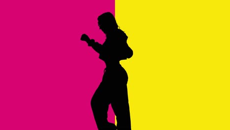 Studio-Silhouette-Of-Woman-Dancing-Against-Yellow-And-Pink-Backgrounds