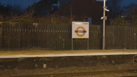 Early-Morning-Shot-Empty-Platform-At-Railway-Station-At-In-Bushey-UK
