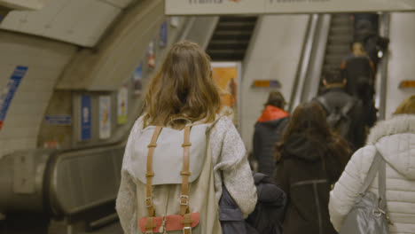 Commuter-Passengers-Walking-Towards-Escalators-At-Underground-Station-Of-London-UK