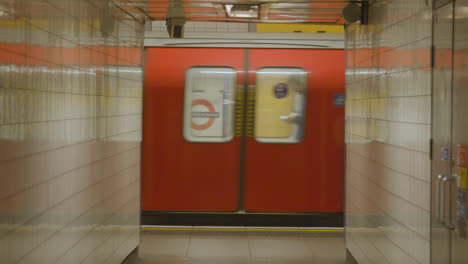 Close-Up-Of-Tube-Train-Leaving-Platform-At-Underground-Station-Of-London-King's-Cross-St-Pancras-UK-1