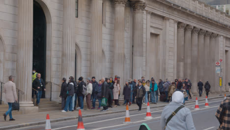 People-Queueing-Outside-The-Bank-Of-England-Building-In-City-Of-London-UK