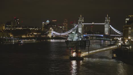 Tower-Bridge-And-City-Skyline-With-HMS-Belfast-On-River-Thames-London-UK-At-Night-1