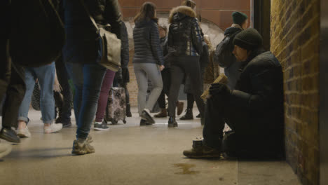 Homeless-Person-Begging-In-London-Bridge-Area-UK-At-Night-