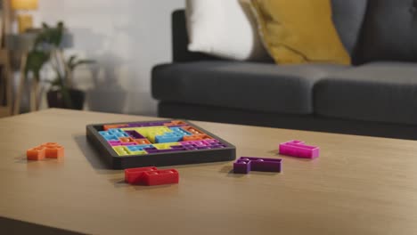 Coloured-Interlocking-Shape-Puzzle-On-Table-At-Home-For-Child-Diagnosed-With-ASD-2