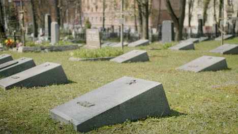 Graveyard-With-Tombstones-In-An-Urban-Area-On-A-Sunny-Day