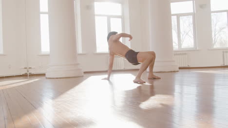 Contemporary-Male-Japanese-Dancer-Training-Dance-Moves-On-The-Studio-Floor-2