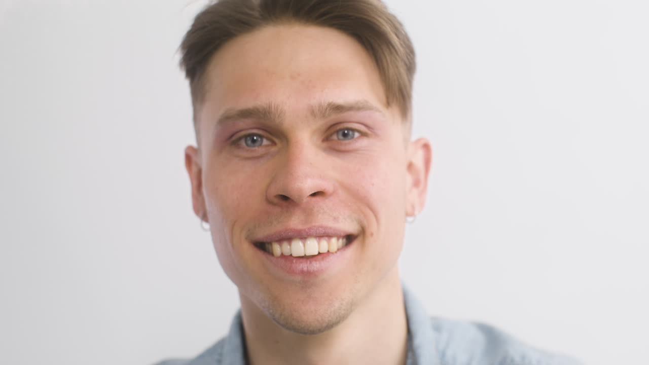 Free stock video - Close up portrait of happy man smiling