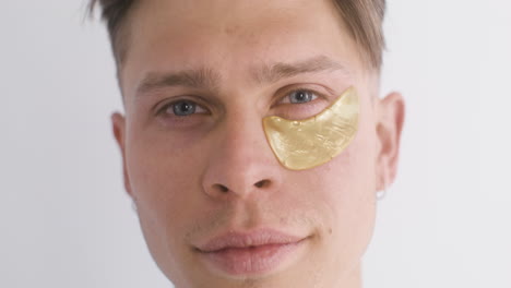 Blond-Guy-Removes-The-Golden-Patch-Under-Her-Right-Eye
