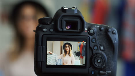 Close-Up-Of-The-Camera-Screen-On-Which-Young-Fashion-Blogger-Talking-About-Clothes