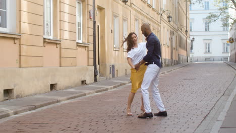 Interracial-Couple-Dancing-Bachata-In-The-Old-Town-Street-12