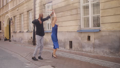 Interracial-Couple-Dancing-Salsa-In-The-Old-Town-Street-5