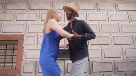Interracial-Couple-Dancing-Salsa-In-The-Old-Town-Street-17