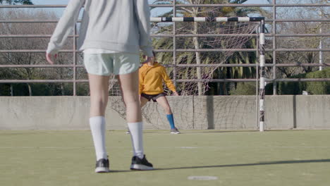 Teenager-Girl-Doing-Penalty-Kick