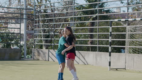 Young-Female-Football-Players-Enjoying-Freestyle-Soccer