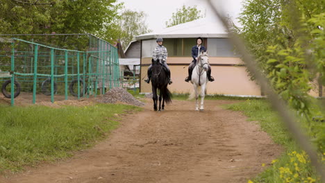 Two-Friends-Riding-Horses-Calmly