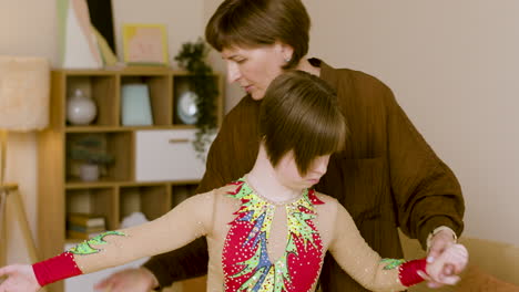 Girl-with-down-syndrome-practicing-dance-with-the-help-of-her-mother