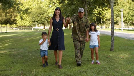 Happy-military-man-and-his-family-enjoying-leisure-time