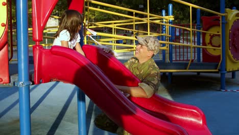 Happy-military-daddy-enjoying-time-with-little-daughter