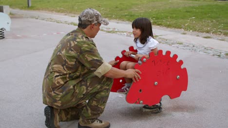Girl-enjoying-time-with-military-daddy