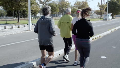 Active-elder-runners-jogging-outside