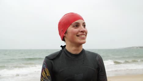 Portrait-of-female-swimmer-smiling-at-camera