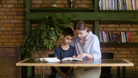 Teacher-and-pupil-reading-the-bible