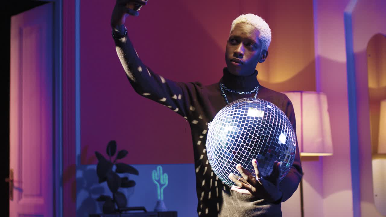 Free stock video - Young stylish african american holding disco ball ...