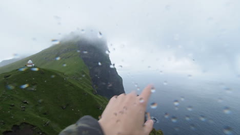 Vlogger-exploring-Faroe-Islands-in-harsh-weather-showing-what-he-see's