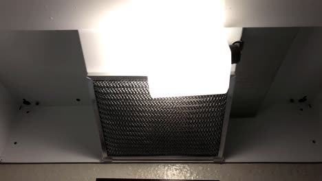 Kitchen-stove-vent-with-light-on