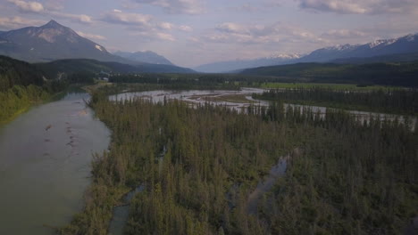 4K-Wide-shot-of-Columbia-river-in-Canada-surrounded-by-mountains,-Canadian-Rockies---daytime,-Aerial