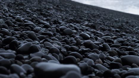 Black-pebbles-and-reynisdrangar-in-Iceland
