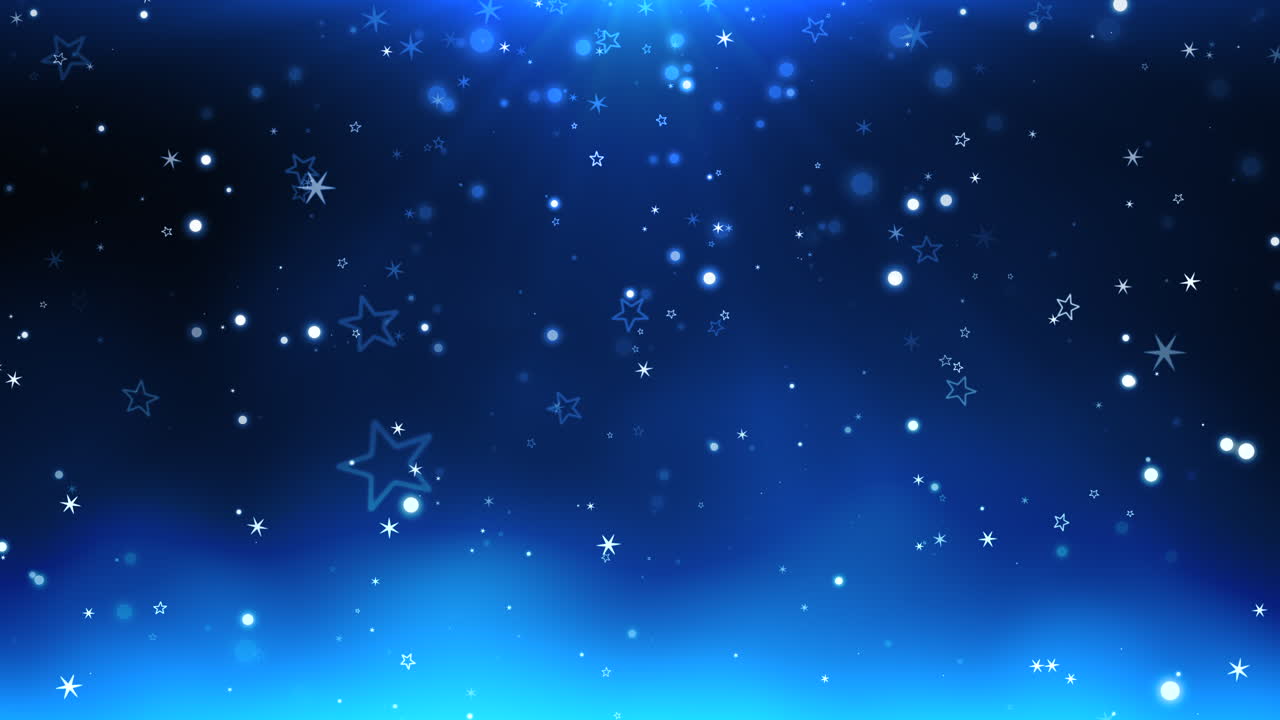 Premium stock video - Dazzling snowflakes light up the night sky on a ...