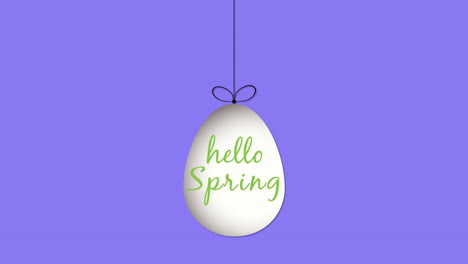 Hola-Primavera,-Un-Huevo-Vibrante-Se-Balancea,-Dando-La-Bienvenida-A-La-Temporada-Con-Deleite.