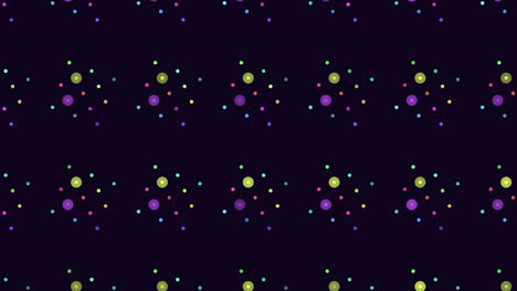 Colorful-dots-arranged-in-symmetrical-circular-pattern-on-black-background
