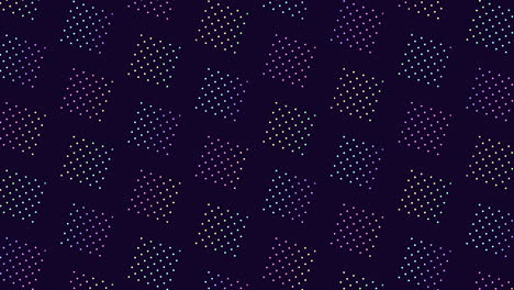 Symmetrical-geometric-pattern-of-colored-dots-on-dark-background
