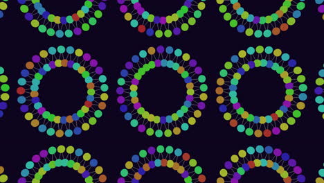 Colorful-circles-in-a-symmetrical-pattern-on-black-background