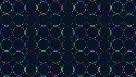 Caleidoscopio-Circular-Patrón-Vibrante-De-Círculos-De-Colores-Sobre-Fondo-Negro
