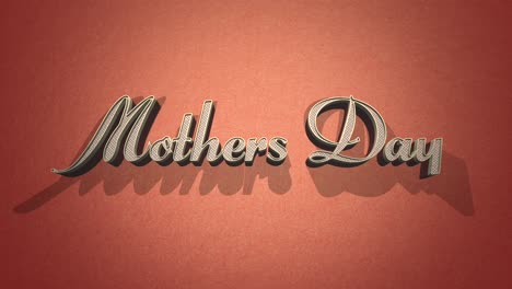 Metallic-themed-Mothers-Day-text-shines-against-vibrant-orange-backdrop