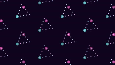 Purple-and-green-dot-triangle-pattern-on-black-background