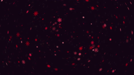 Striking-red-snowflake-pattern-falling-circles-on-black