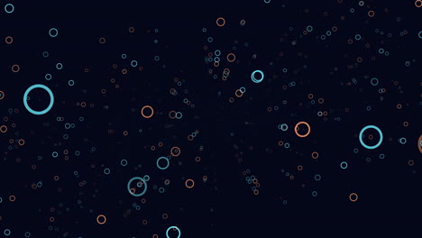 Vibrant-blue-and-orange-spinning-circles-on-black-background