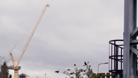 Tower-Crane-Working-On-Construction-Site-In-City-Centre-Of-Oxford