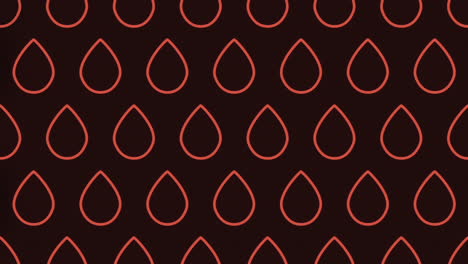 Red-teardrop-droplets-form-an-intriguing-pattern-on-dark-background